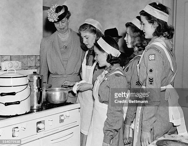 First Lady Eleanor Roosevelt, honorary President of the Girl Scouts National Little House in Washington, DC, attends a luncheon in her honor on April...