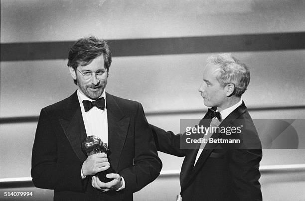 Los Angeles, CA: Steven Spielberg is congratulated by Richard Dreyfus after he was awarded the Irving Thalberg Memorial Award at the Academy Awards...