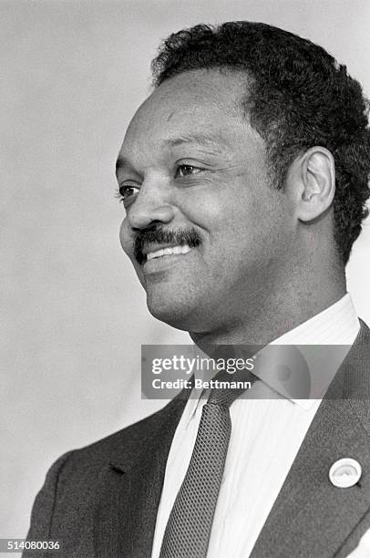 Laconia, NH: A smiling Jesse jackson fields questions during a 6/16 news conference here as Jackson introduced members of his Rainbow Coalition, from...