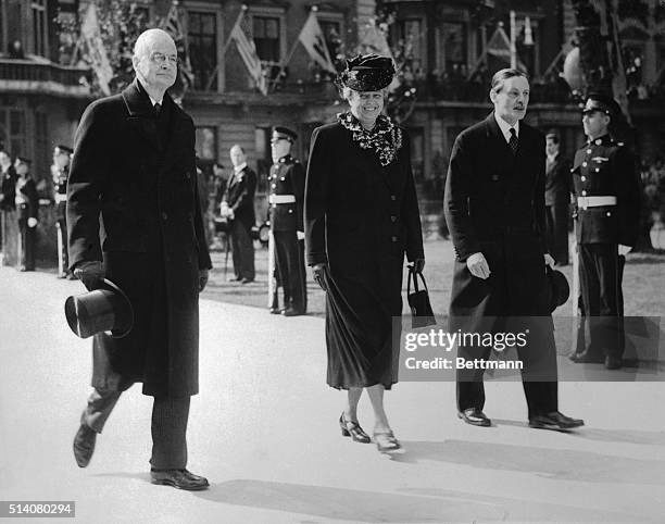 Mrs. Roosevelt unveiled the memorial to her husband in Grosvenor Square. At the unveiling were their majesties the King and Queen; the Ambassador to...