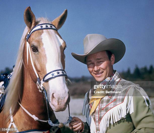 Roy Rogers, an American actor and singer and his horse, Trigger.