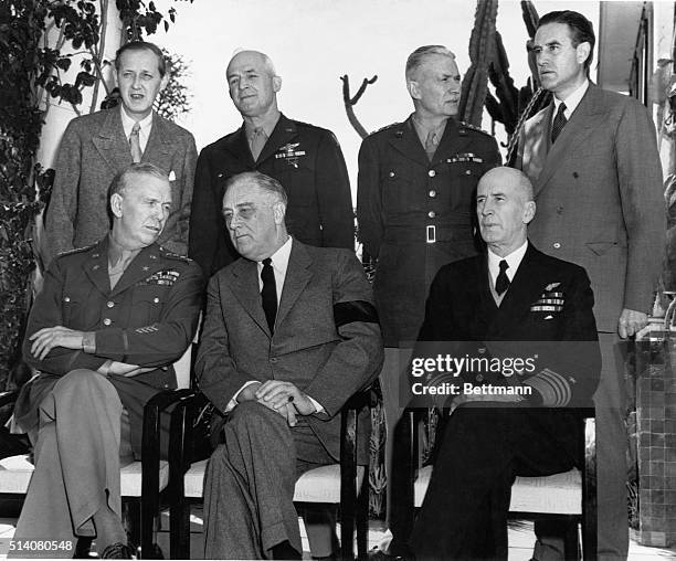 The U.S. Leaders sit in the President's villa in Casablanca for a meeting with the British. Left to right, seated: Chief of Staff General George C....