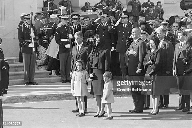 Jackie Kennedy stands with her children, Caroline and John, Jr., and brother-in-law Robert Kennedy at the funeral of her late husband on November 25,...