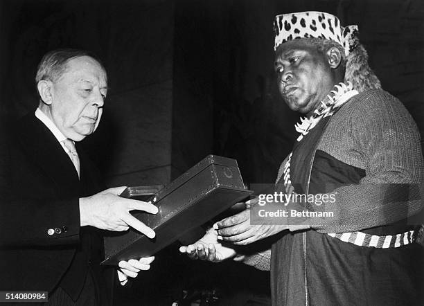 African National Congress President Albert Lutuli receives the 1960 Nobel Peace Prize from Gunnar Jahn, chairman of the Norwegian Nobel Peace Prize...