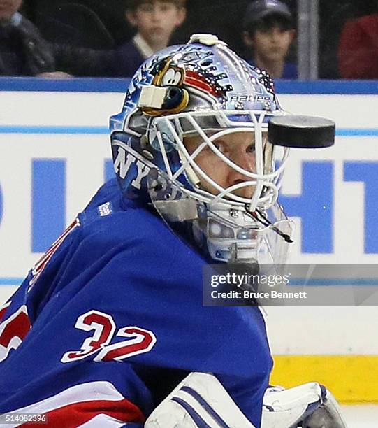 Antti Raanta of the New York Rangers watches a first period shot sail past him against the New York Islanders at Madison Square Garden on March 6,...