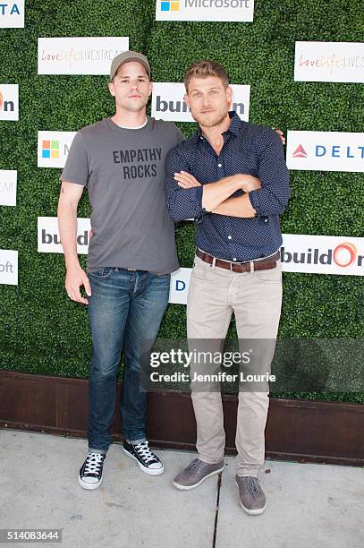 Actors Max Carver and Travis Van Winkle arrive at the 2nd Annual LoveLife Fundraiser to support buildOn hosted by Travis Van Winkle at the Microsoft...