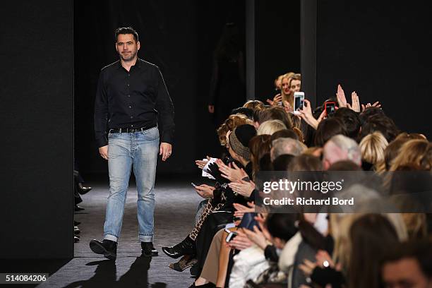 Designer Roland Mouret walks the runway after the Roland Mouret show as part of the Paris Fashion Week Womenswear Fall/Winter 2016/2017 on March 6,...