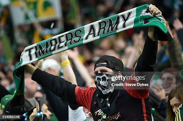 Member of the 'Timbers Army' cheers after the Portland Timbers scored a goal during the second half of the game against the Columbus Crew at...