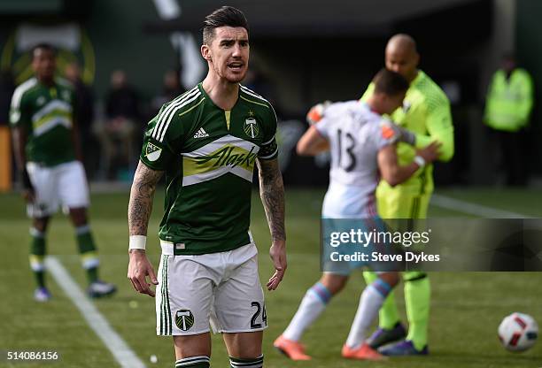 Liam Ridgewell of Portland Timbers has some words with the side judge during the second half of the game against the Columbus Crew at Providence Park...