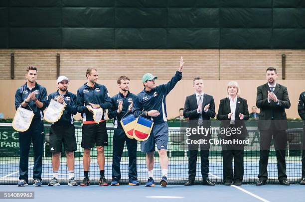 Captain of Romania, Andrei Pavel, salutes the public during day 1 of the Davis Cup World Group first round tie between Romania and Slovenia, on March...