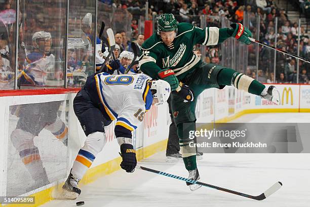 David Jones of the Minnesota Wild and Jay Bouwmeester of the St. Louis Blues collide during the game on March 6, 2016 at Xcel Energy Center in St....