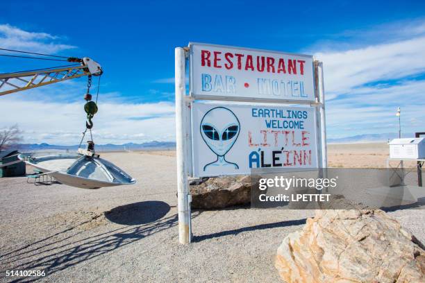 road sign in rachel, nevada - area 51 stock pictures, royalty-free photos & images