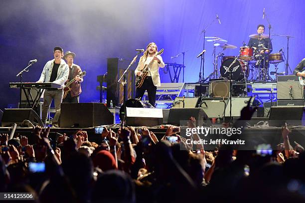 Eric Krasno, Ben Lovett, Marcus Mumford and Winston Marhall perform on stage at the Okeechobee Music & Arts Festival, Day 4, on March 6, 2016 in...