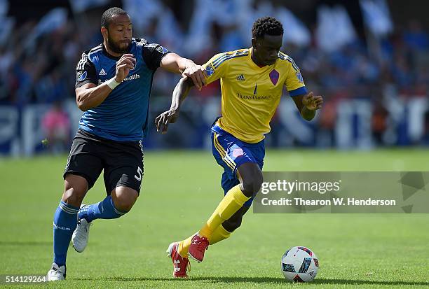 Victor Bernardez of San Jose Earthquakes chases for control of the ball with Dominique Badji of Colorado Rapids during their MLS Soccer game in the...