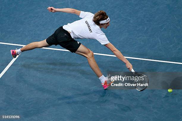Alexander Zverev of Germany plays a backhand in his match against Lukas Rosol of Czech Republic during Day 3 of the Davis Cup World Group first round...