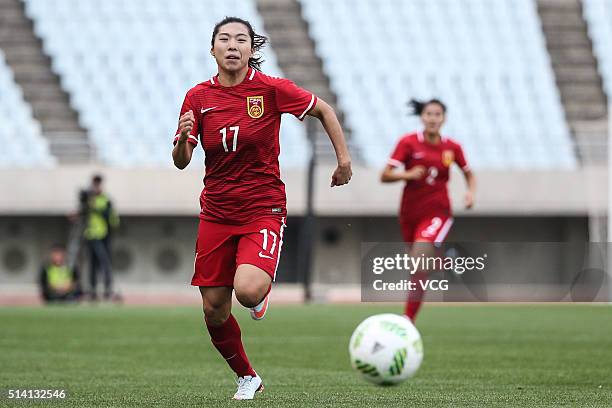 Gu Yasha of China drives the ball during the AFC Women's Olympic Final Qualification Round match between China and South Korea at Yanmar Stadium...