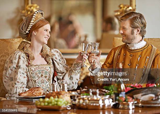 here's to health and happiness m'lady - tudor women stock pictures, royalty-free photos & images