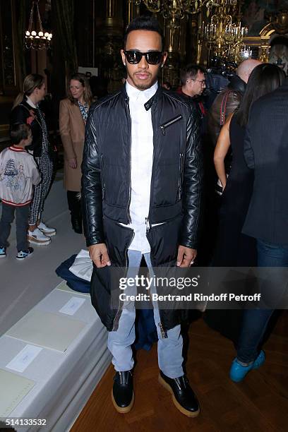 Formula One Driver Lewis Hamilton attends the Stella McCartney show as part of the Paris Fashion Week Womenswear Fall/Winter 2016/2017. Held at Grand...