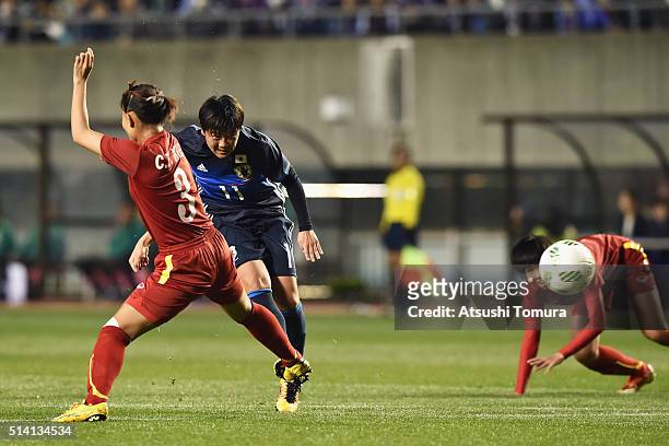 Shinobu Ohno of Japan shoots at goal during the AFC Women's Olympic Final Qualification Round match between Vietnam and Japan at Kincho Stadium on...