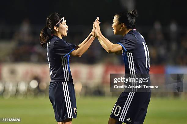 Nahomi Kawasumi of Japan celebrates scoring her team's third goal with her team mate Yuki Ogimi during the AFC Women's Olympic Final Qualification...