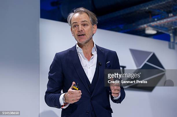 Adrian van Hooydonk, Chief Designer of German automaker BMW, speaks during a press conference ahead of the celebration marking the 100th anniversary...