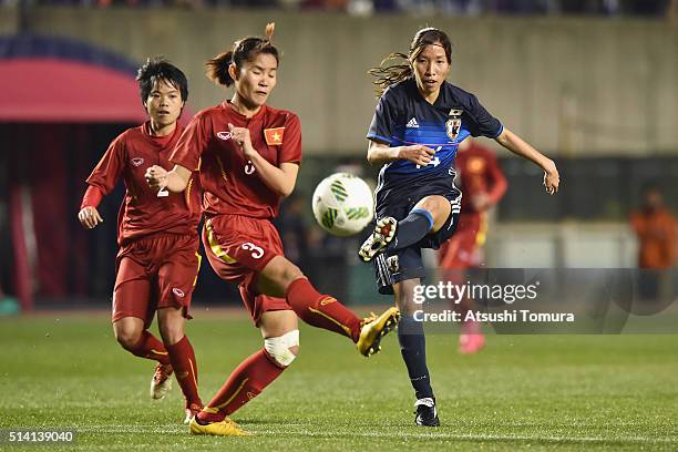 Emi Nakajima of Japan scores her team's fourth goal during the AFC Women's Olympic Final Qualification Round match between Vietnam and Japan at...