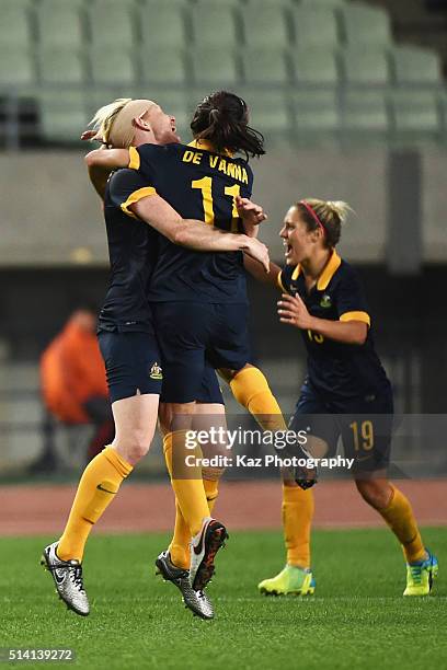 Clare Polkinghorne and Lisa De Vanna of Australia celebrate their qualification to the Rio de Janeiro Olympic after their 2-1 win in the AFC Women's...