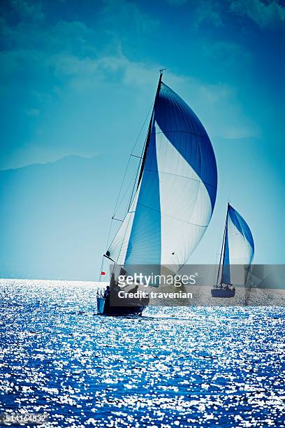 sailing with sailboat - regatta stockfoto's en -beelden