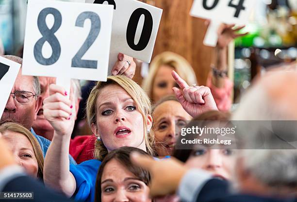 auction crowd - live auction stock pictures, royalty-free photos & images