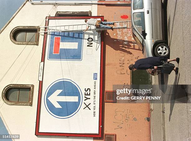 Poster goes up in The Shanklin Road, 18 May, with four days of campaigning left before Friday's referendum. Today US. President Bill Clinton joined...