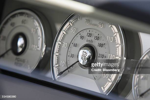 The speedometer sits on the instrument panel of a Rolls-Royce Dawn automobile, produced by Rolls-Royce Motor Cars Ltd., the ultra-luxury brand of...