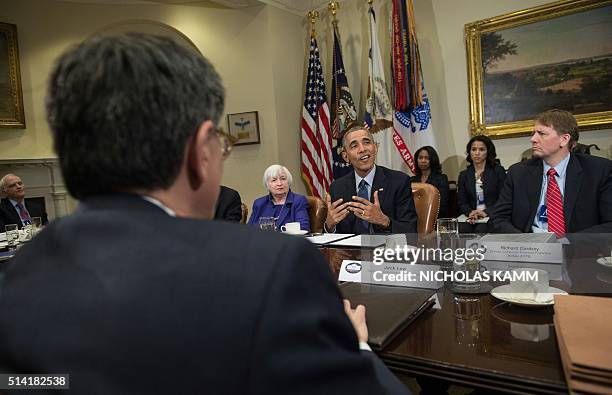 President Barack Obama speaks to the press following a meeting with financial regulators at the White House in Washington, DC, on March 7, 2016 to...