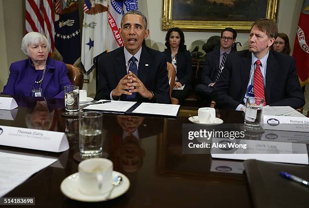 President Barack Obama speaks Chair of the Federal Reserve Janet Yellen and Director of the Consumer Financial Protection Bureau Richard Cordray...