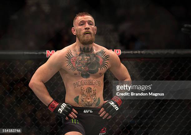 Conor McGregor prepares for the second round to begin while facing Nate Diaz in their welterweight bout during the UFC 196 in the MGM Grand Garden...