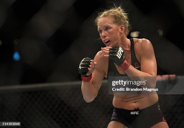 Holly Holm circles Miesha Tate during their women's bantamweight championship bout during the UFC 196 in the MGM Grand Garden Arena on March 5, 2016...