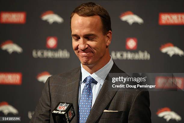 Quarterback Peyton Manning reacts as he announces his retirement from the NFL at the UCHealth Training Center on March 7, 2016 in Englewood,...