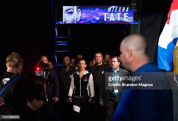 Miesha Tate prepares to enter the Octagon before facing Holly Holm in their women's bantamweight championship bout during the UFC 196 in the MGM...