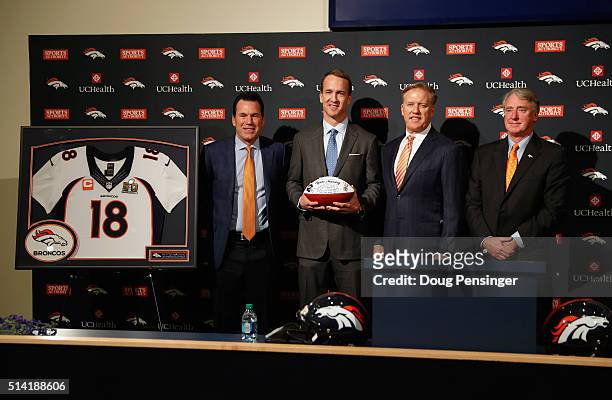 Denver Broncos Head Coach Gary Kubiak, quarterback Peyton Manning, Denver Broncos Executive Vice President of Football Operations and General Manager...