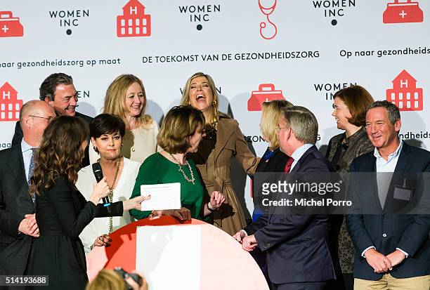 Queen Maxima of The Netherlands poses with health care industry stake holders during the Women Inc. Gender sensitive health care seminar on March 7,...