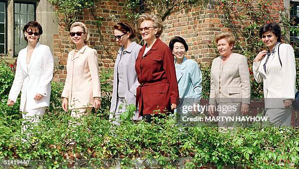 Cherie Blair leads the wives of the G8 leaders into the gardens at Chequers, the Prime Minister's official country home, 16 May. Cherie Blair,...