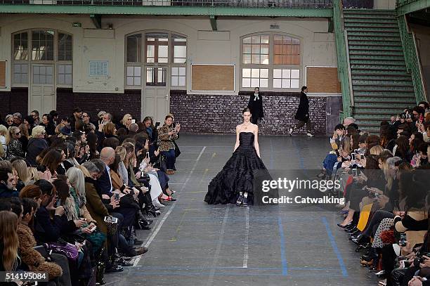 Model walks the runway at the John Galliano Autumn Winter 2016 fashion show during Paris Fashion Week on March 6, 2016 in Paris, France.