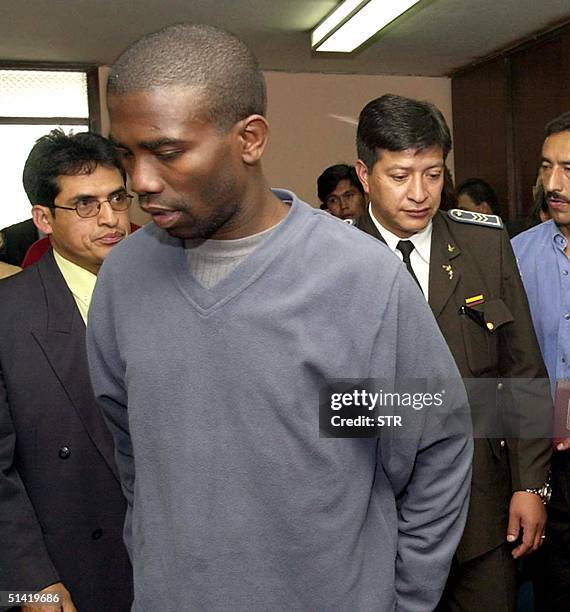 This photo shows Haitian police commisioner Guy Philippe as he is arrested 20 December 2001 in Quito, Ecuador. Fotografia tomada el 20 de diciembre...