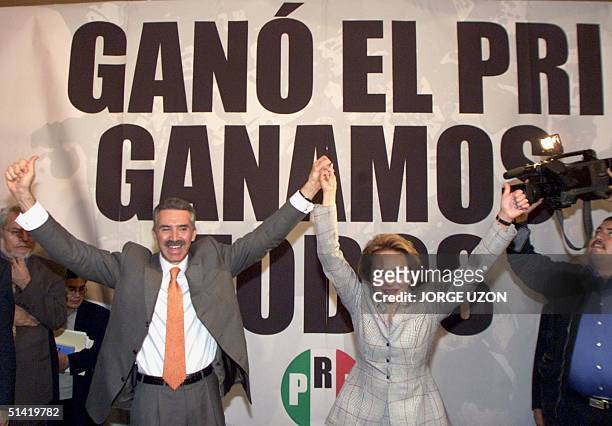 Presidential candidate for the Partido Revolucionario Instituticional Roberto Madrazo celebrates his victory with Elba Esther de Gordillo , in Mexico...