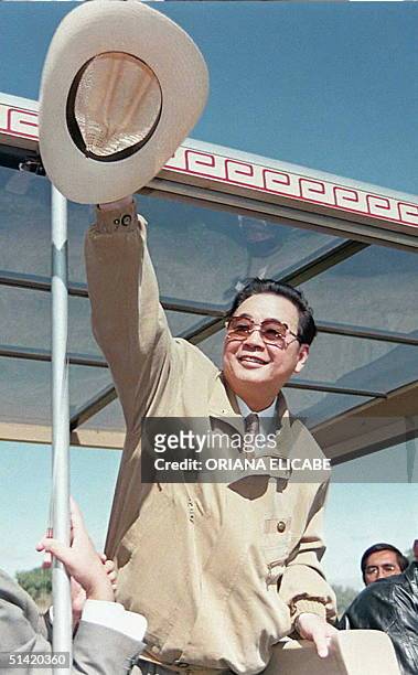 Li Peng, prime minister of the Republic of China, waves to tourists at at the Teotihuacan pyramids just outside of Mexico City 07 October. Li Peng is...