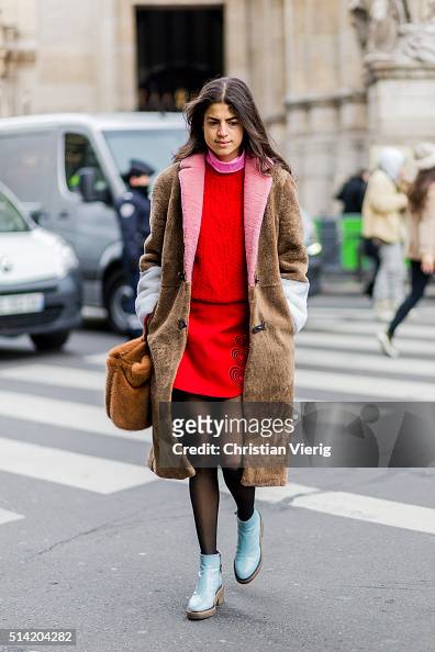 Leandra Medine wearing a Saks Potts coat, red jumper and skirt... News ...