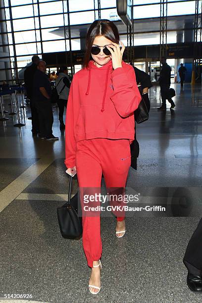 Selena Gomez is seen at LAX on March 07, 2016 in Los Angeles, California.