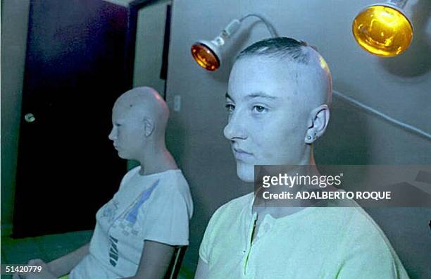 Oxana Gaibon and Alla Kozimierka both victims of the 1986 Chernobyl nuclear disaster,receive infrared radiation treatment 12 December at the Tarara...