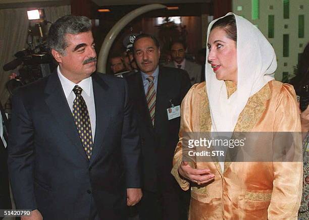 Lebanese Prime Minister Rafic Hariri meets with Pakistani Prime Minister Benazir Bhutto on the sidelines of the seventh summit of the Organization of...