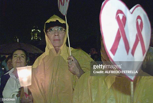 Men and women participate in the 13th March of Silence, in memory of those suffering with HIV/AIDS, an event that took place in Mexico City, the 09...