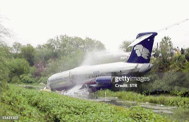 Five people died and 40 were injured 06 October, 2000 as an Aeromexico airliner plane skidded off the runway in Reynosa, in storm-battered...